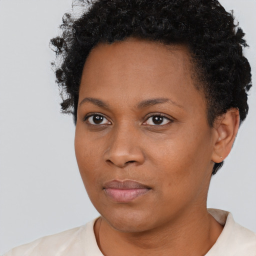Neutral black young-adult female with short  black hair and brown eyes