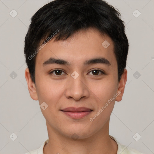 Joyful asian young-adult male with short  brown hair and brown eyes