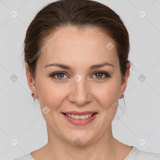 Joyful white adult female with medium  brown hair and grey eyes