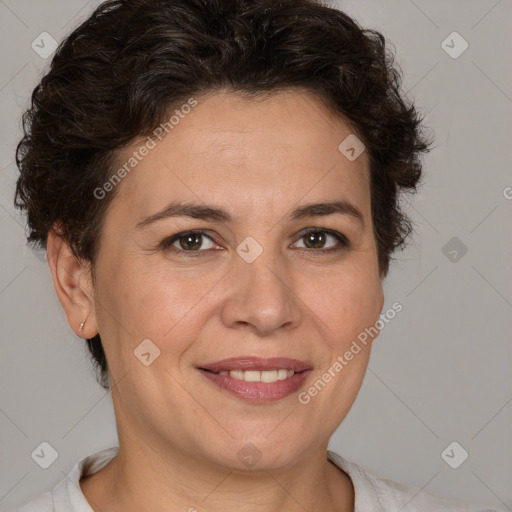 Joyful white adult female with short  brown hair and brown eyes