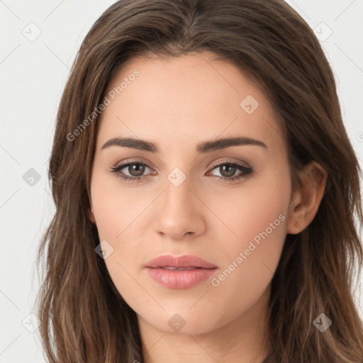 Neutral white young-adult female with long  brown hair and brown eyes