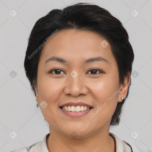 Joyful asian young-adult female with short  brown hair and brown eyes