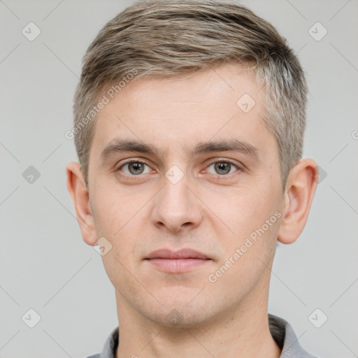 Neutral white young-adult male with short  brown hair and grey eyes