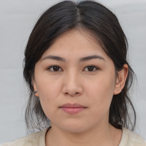 Neutral asian young-adult female with medium  brown hair and brown eyes