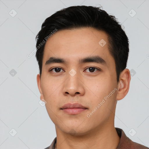 Neutral asian young-adult male with short  black hair and brown eyes