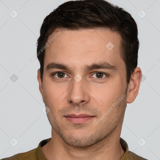 Neutral white young-adult male with short  brown hair and brown eyes