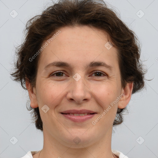 Joyful white adult female with short  brown hair and brown eyes