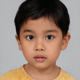 Neutral asian child male with short  brown hair and brown eyes