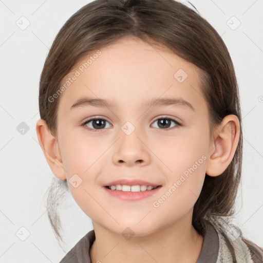 Joyful white child female with medium  brown hair and brown eyes