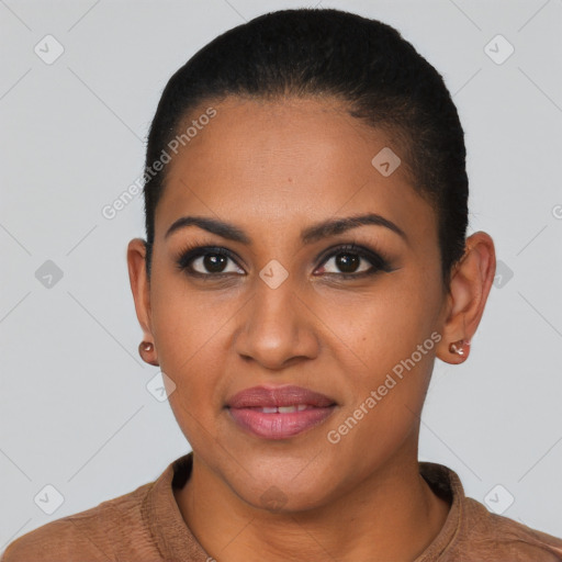 Joyful latino young-adult female with short  brown hair and brown eyes