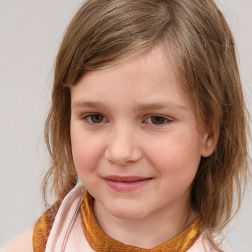 Joyful white child female with medium  brown hair and brown eyes