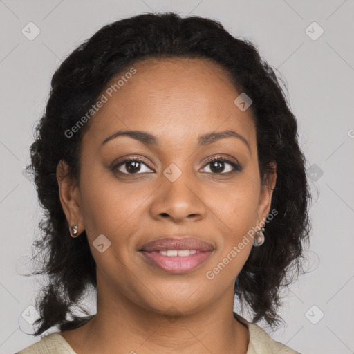 Joyful black young-adult female with medium  brown hair and brown eyes