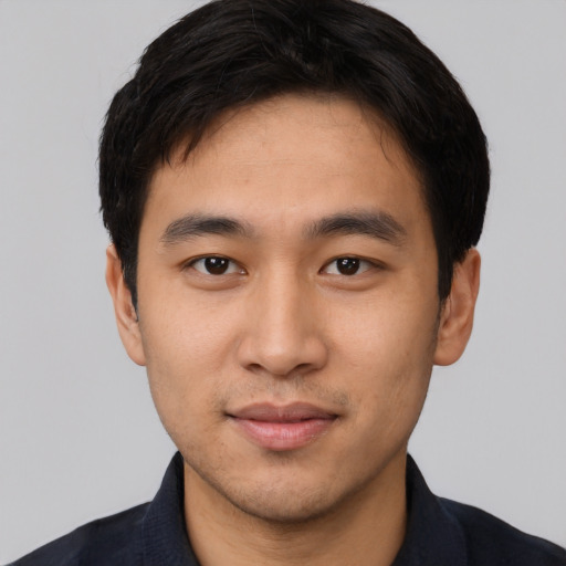 Neutral asian young-adult male with short  black hair and brown eyes
