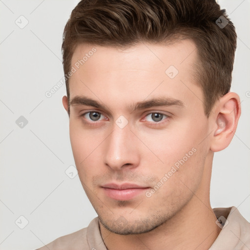 Neutral white young-adult male with short  brown hair and brown eyes