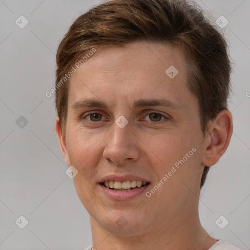 Joyful white young-adult female with short  brown hair and grey eyes