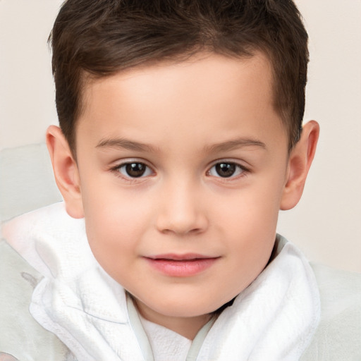 Joyful white child male with short  brown hair and brown eyes