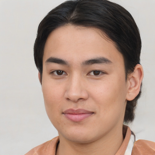 Joyful white young-adult male with medium  brown hair and brown eyes