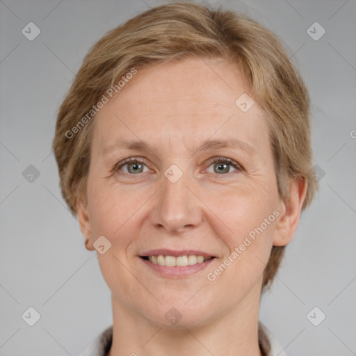 Joyful white adult female with short  brown hair and grey eyes