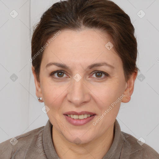 Joyful white adult female with short  brown hair and brown eyes