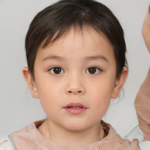 Neutral white child female with medium  brown hair and brown eyes