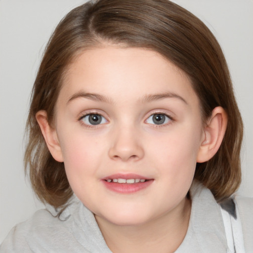 Joyful white child female with medium  brown hair and brown eyes