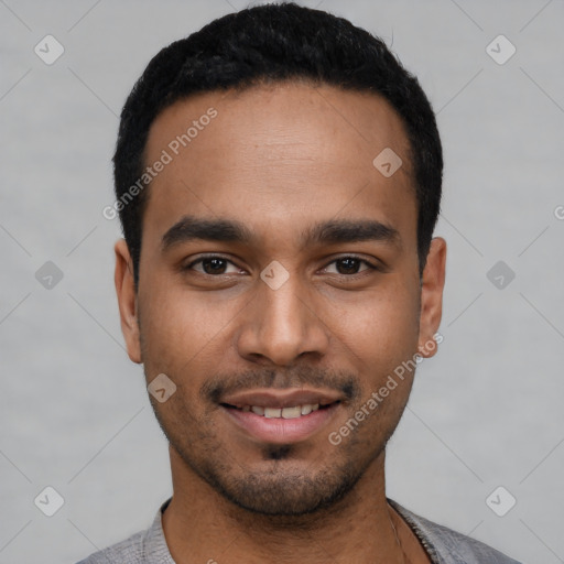 Joyful latino young-adult male with short  black hair and brown eyes