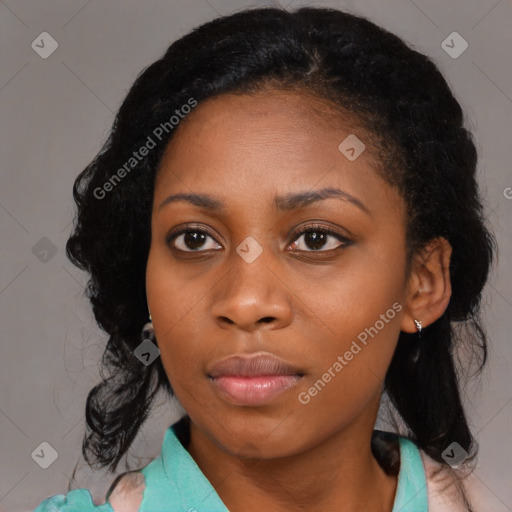 Joyful black young-adult female with medium  black hair and brown eyes