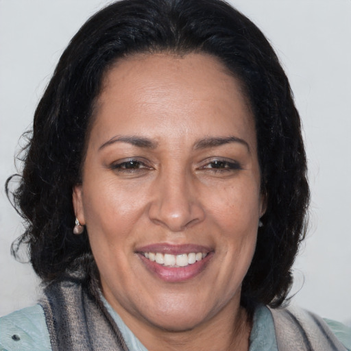 Joyful asian adult female with medium  brown hair and brown eyes