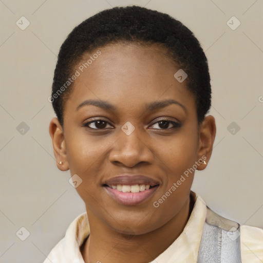 Joyful black young-adult female with short  black hair and brown eyes