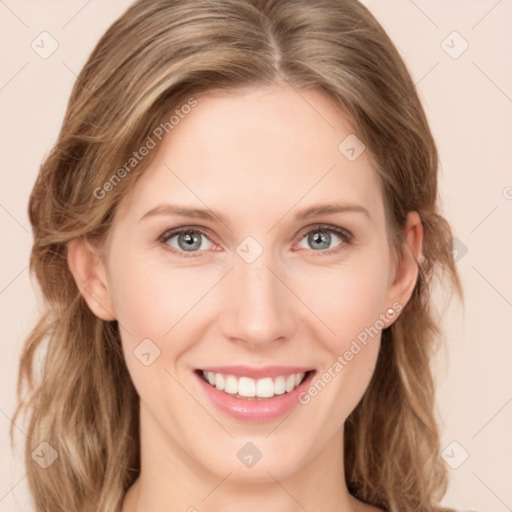 Joyful white young-adult female with medium  brown hair and blue eyes