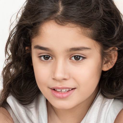 Joyful white child female with long  brown hair and brown eyes