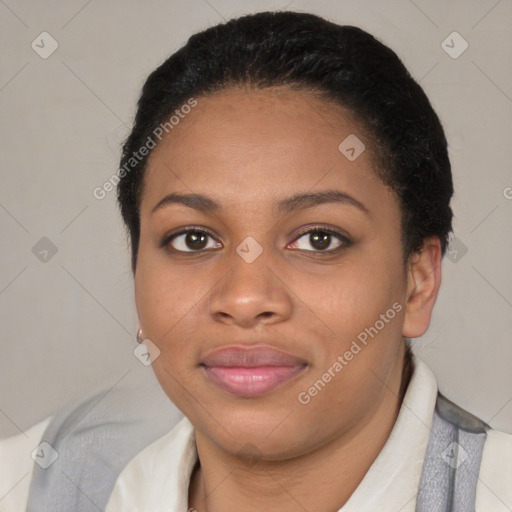 Joyful black young-adult female with short  black hair and brown eyes