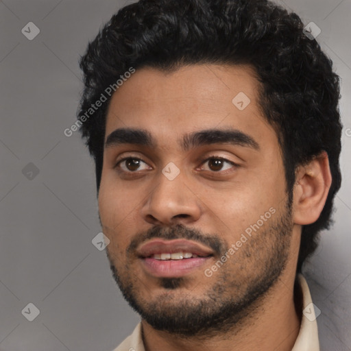 Joyful latino young-adult male with short  black hair and brown eyes