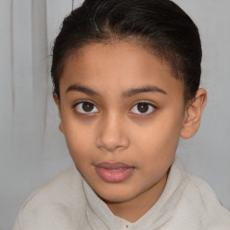 Joyful white child female with short  brown hair and brown eyes