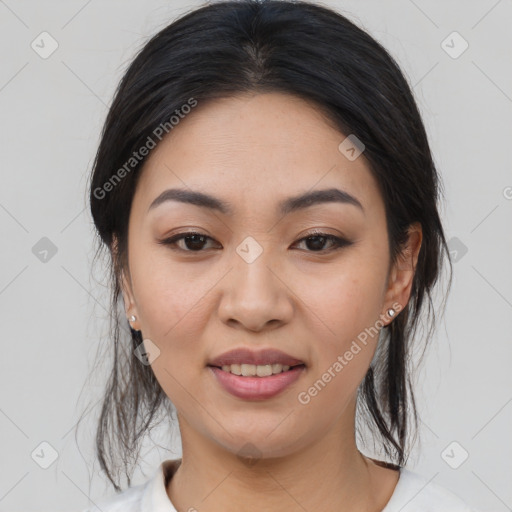 Joyful asian young-adult female with medium  black hair and brown eyes