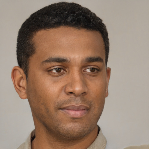 Neutral black young-adult male with short  brown hair and brown eyes