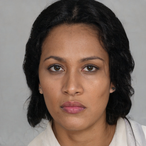 Neutral black young-adult female with medium  black hair and brown eyes