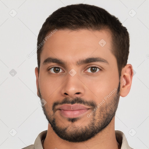 Neutral white young-adult male with short  brown hair and brown eyes