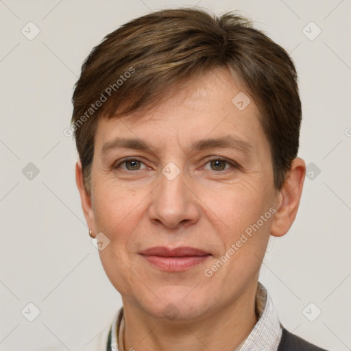 Joyful white adult male with short  brown hair and grey eyes