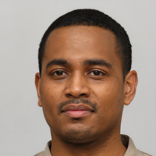 Neutral black young-adult male with short  black hair and brown eyes