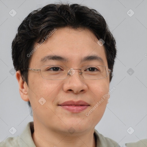 Joyful asian young-adult male with short  brown hair and brown eyes