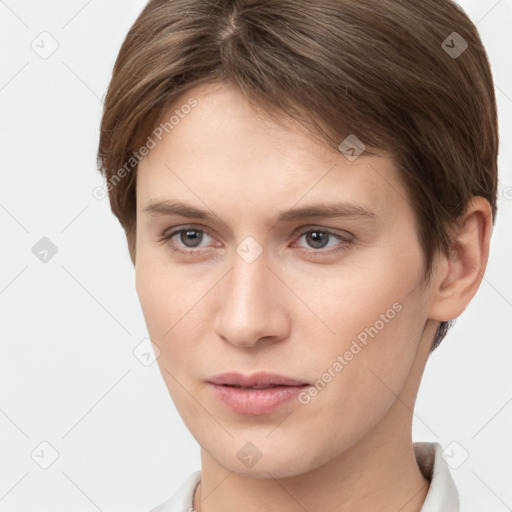 Neutral white young-adult female with short  brown hair and brown eyes