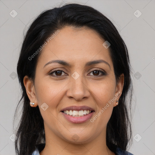 Joyful latino young-adult female with medium  brown hair and brown eyes