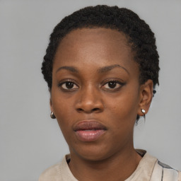 Neutral black young-adult female with short  black hair and brown eyes