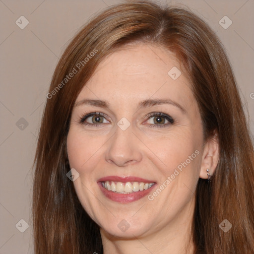 Joyful white adult female with medium  brown hair and brown eyes