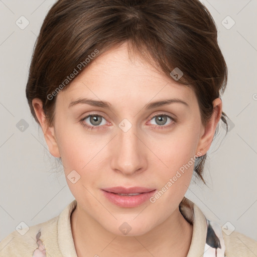 Joyful white young-adult female with medium  brown hair and blue eyes