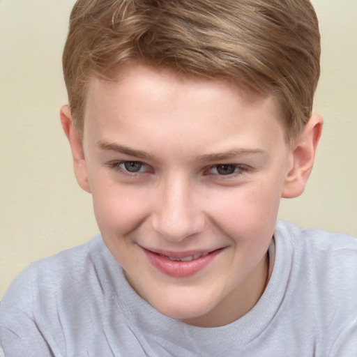 Joyful white child male with short  brown hair and brown eyes