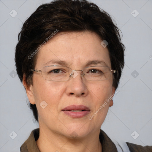 Joyful white adult female with short  brown hair and brown eyes