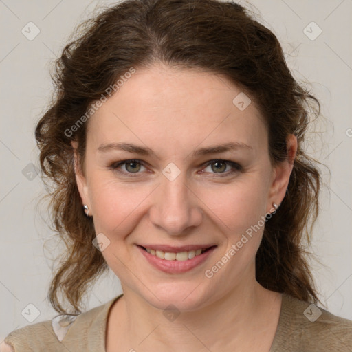 Joyful white young-adult female with medium  brown hair and green eyes