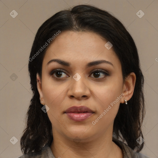 Joyful latino young-adult female with medium  brown hair and brown eyes